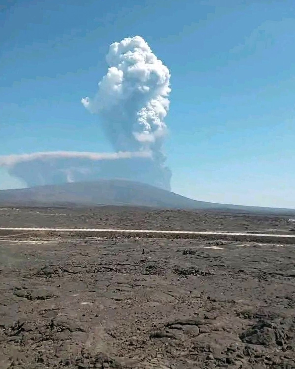 CAPTION CORRECTS HISTORY OF THE VOLCANO - In this photo released by the Afar Government Communication Bureau, ash billows from an eruption of the long-dormant Hayli Gubbi Volcano in Ethiopia's Af ...