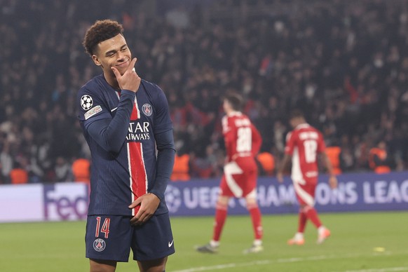 epa11908674 Desire Doue of PSG celebrates scoring the 4-0 goal during the UEFA Champions League knockout phase play-offs 2nd leg soccer match between Paris Saint-Germain and Stade Brest, in Paris, Fra ...