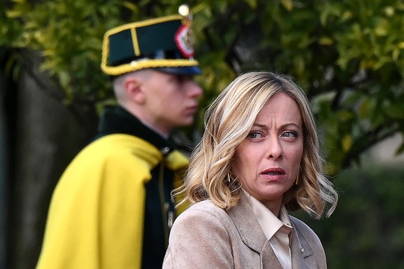 epa11770423 Italian Prime Minister Giorgia Meloni awaits the arrival of Spanish King Felipe VI and and his wife Queen Letizia (not pictured) at Villa Doria Pamphilj in Rome, Italy, 11 December 2024. T ...
