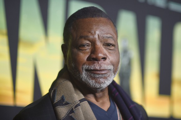 FILE - Carl Weathers arrives at a special screening for the season three premiere of &quot;The Mandalorian&quot; on Tuesday, Feb. 28, 2023, at The Roosevelt Hotel in Los Angeles. Weathers, a former NF ...
