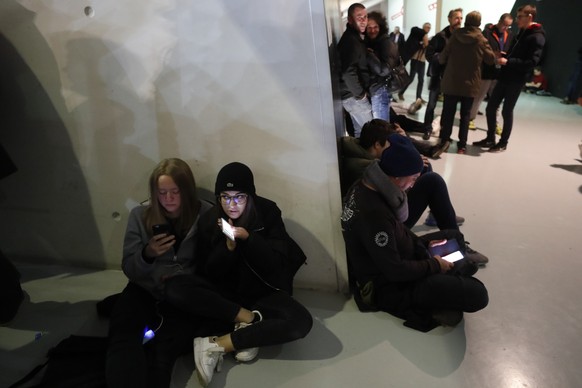 Basket ball supporters wait to leave after a match at the Rhenus Sport stadium in Strasbourg, eastern France, Tuesday Dec.11, 2018. A shooting in the French city of Strasbourg killed at least two peop ...