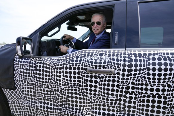 FILE - President Joe Biden stops to talk to the media as he drives a Ford F-150 Lightning truck at Ford Dearborn Development Center, on May 18, 2021, in Dearborn, Mich. (AP Photo/Evan Vucci, File)
Joe ...