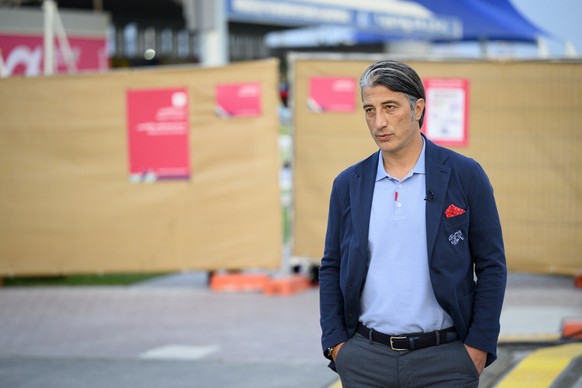 epa10353612 Switzerland's head coach Murat Yakin arrives for a press conference at the University of Doha for Science and Technology training facilities in Doha, Qatar, 07 December 2022. Switzerl ...