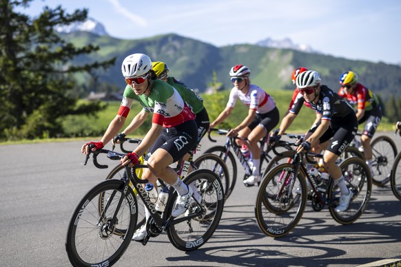 epa13053586 Elisa Longo Borghini (L) of Italy and UAE Team ADQ competes during the fifth and final stage of the Tour de Suisse Women, a 100 km race starting and finishing in Villars-sur-Ollon, Switzer ...