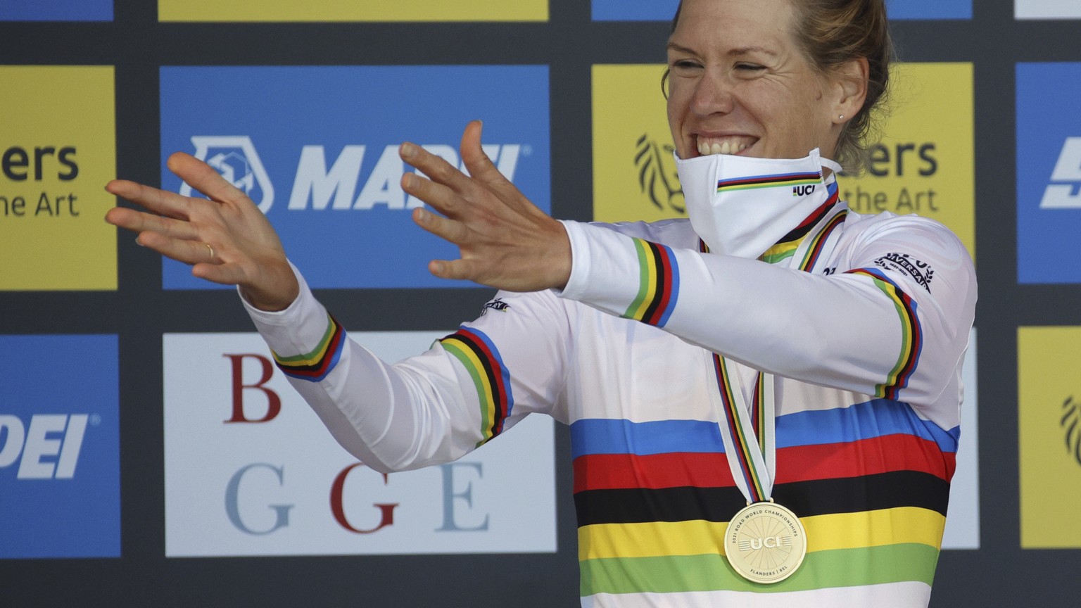 Netherlands&#039; Ellen Van Dijk celebrates on the podium after the Women Elite individual time trial race at the World Road Cycling Championships in Bruges, Belgium, Monday Sept. 20, 2021. (AP Photo/ ...