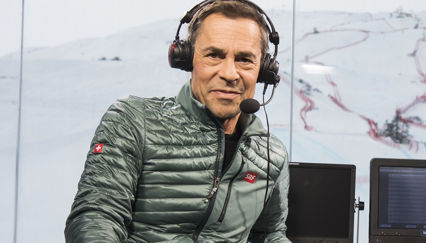 Matthias Hueppi, left, and Bernhard Russi, right, commentators of the Swiss TV, SRF, pose in the studio during the 2017 FIS Alpine Skiing World Championships in St. Moritz, Switzerland, Tuesday, Febru ...