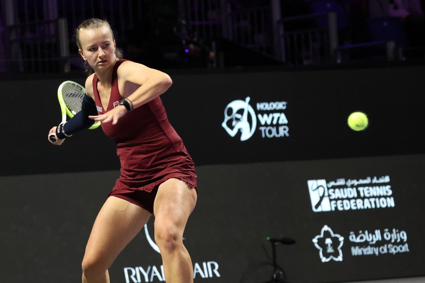 epa11702880 Barbora Krejcikova of Czech Republic in action against Jessica Pegula of USA during the WTA Finals group stage match in Riyadh, Saudi Arabia, 05 November 2024. EPA/MARCIN CHOLEWINSKI POLAN ...