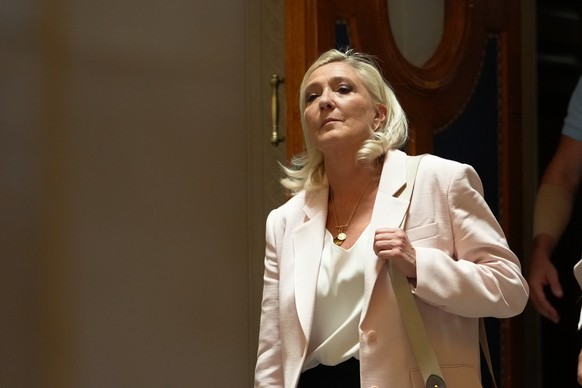 Far-right leader Marine Le Pen leaves the courtroom after the verdict of her appeal trial, in Paris, France, Tuesday, July. 7, 2026. (AP Photo/Aurelien Morissard)
France Le Pen Trial