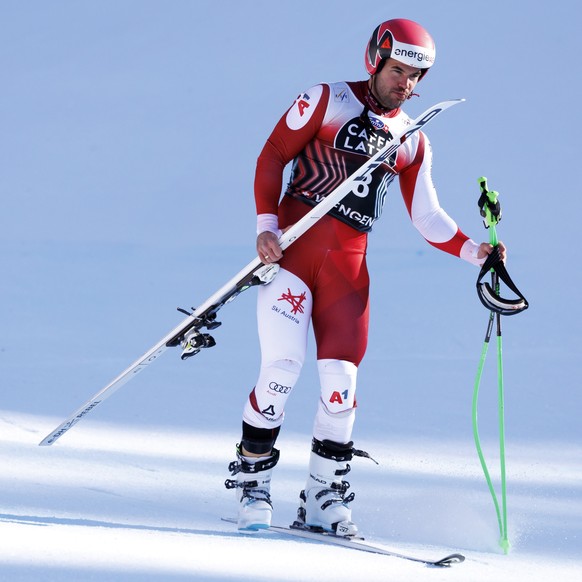 Vincent Kriechmayr of Austria reacts after a fall in the finish area during the men&#039;s Downhill race at the Alpine Skiing FIS Ski World Cup, in Wengen, Switzerland, Saturday, January 18, 2025. (KE ...