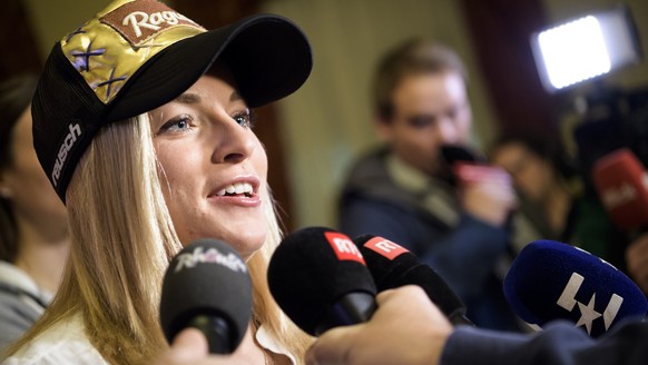 Ski racer Lara Gut from Switzerland, speaks to journalists during the Swiss-Ski federation press conference at the FIS Alpine Ski World Cup, in St. Moritz, Switzerland, Thursday, December 7, 2017. (KE ...