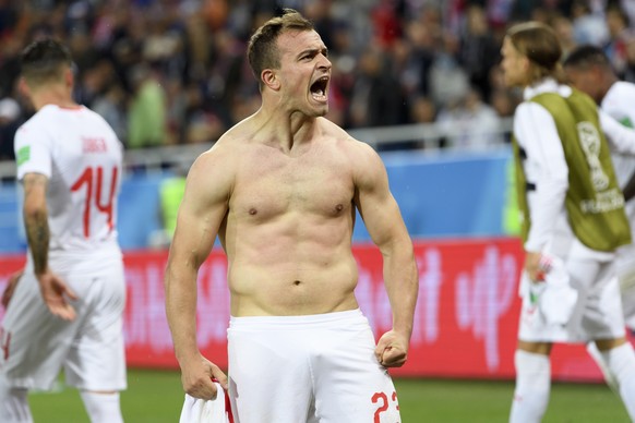 Switzerland&#039;s midfielder Xherdan Shaqiri celebrates after scoring the winning goal during the FIFA World Cup 2018 group E preliminary round soccer match between Switzerland and Serbia at the Aren ...