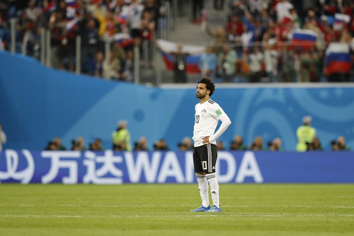 Egypt's Mohamed Salah reacts after Russia's team scored second goal during the group A match between Russia and Egypt at the 2018 soccer World Cup in the St. Petersburg stadium in St. Peters ...