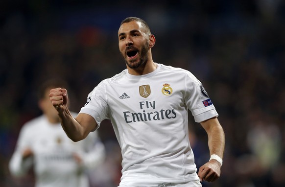 FILE - In this Tuesday, Dec. 8, 2015 file photo, Real Madrid&#039;s Karim Benzema celebrates scoring the opening goal during a Champions League group A soccer match between Real Madrid and Malmo at th ...