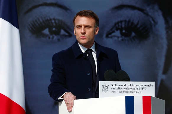 epa11206496 French President Emmanuel Macron speaks during a ceremony to seal the right to abortion in the French Constitution, on International Women's Day, at Place Vendome, in Paris, France...