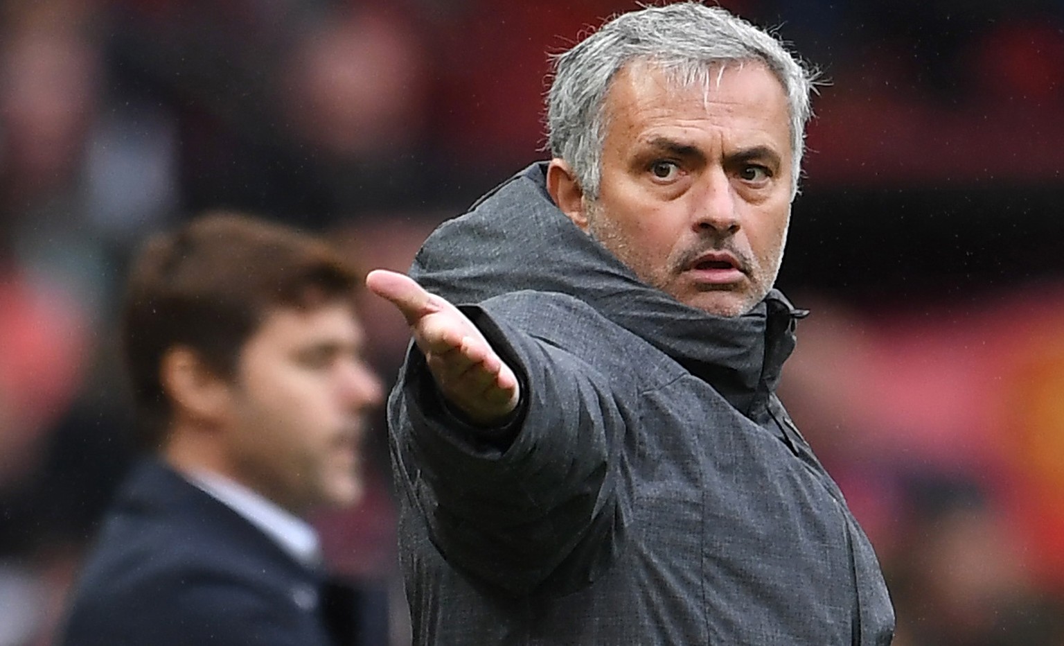 epa08010678 (FILE) - Manchester United manager Jose Mourinho (R) with Tottenham manager Mauricio Pochettino (L) during the United 1-0 win over Tottenham during an English Premier League soccer match a ...