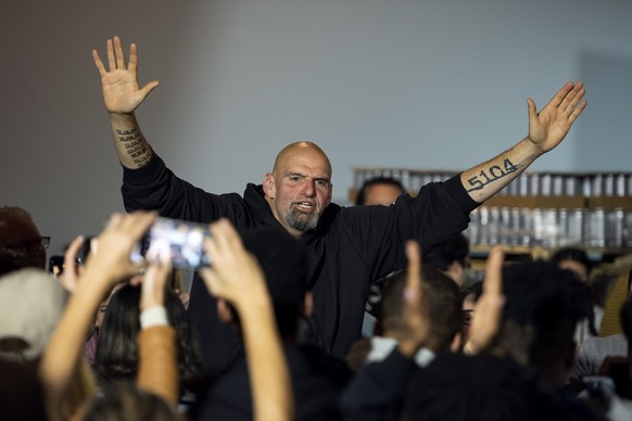 Pennsylvania Lt. Gov. John Fetterman, Democratic candidate for U.S. Senate, thanks supporters following a discussion with Sen. Amy Klobuchar, D-Minn., at Stolen Sun Craft Brewing Company in Exton, Pa. ...