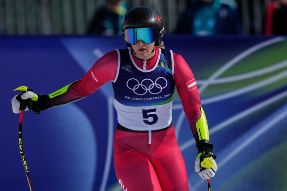 Austria's Nina Ortlieb at the finish area during an alpine ski, women's downhill official training, at the 2026 Winter Olympics, in Cortina d'Ampezzo, Italy, Friday, Feb. 6, 2026. (AP P ...