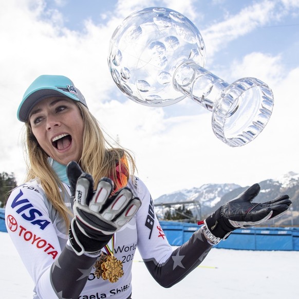 epa07445015 Mikaela Shiffrin of the US poses with her Overall Globe and Globes in other events at the FIS Alpine Skiing World Cup finals in Soldeu-El Tarter, Andorra, 17 March 2019. EPA/CHRISTIAN BRUN ...