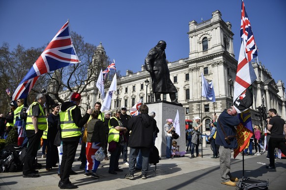 epa07470887 Brexit protesters rally outside of the Parliament in London, Britain, 29 March 2019. MPs are debating in the Houses of Parliament the withdrawal agreement for the third time. EPA/NEIL HALL
