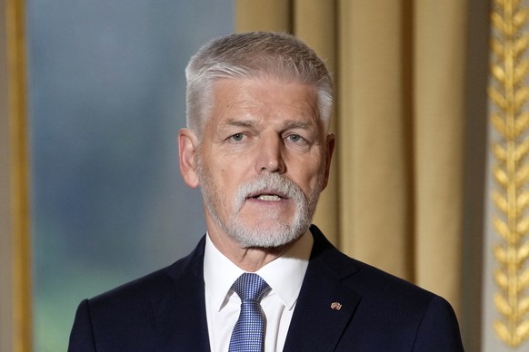 epa11038538 Czech President Petr Pavel speaks during a joint statement to the press with the French President at the Elysee Palace in Paris, France, December 20, 2023. EPA/Christophe Ena /…