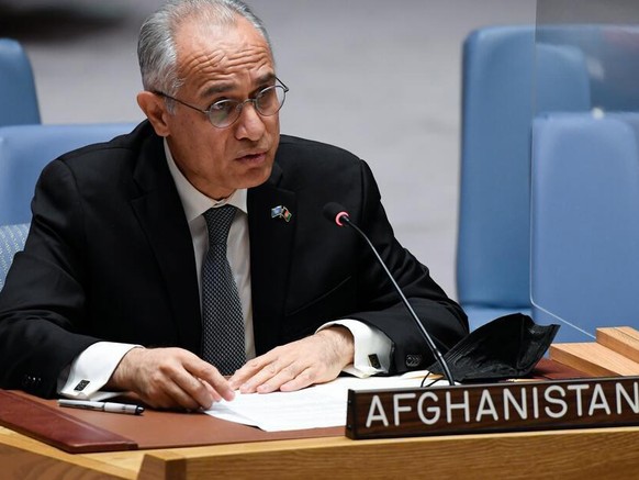 epa09416811 A handout photo made available by the United Nations showing Ambassador Ghulam M. Isaczai, the Islamic Republic of Afghanistan?s Permanent Representative to the United Nations, addresses a ...