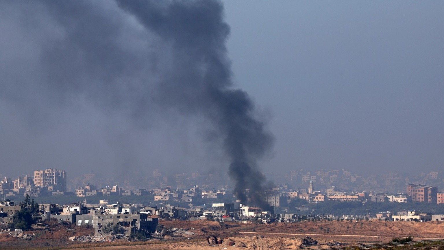 epa11006766 Smoke rises after an explosion on the northern part of the Gaza Strip, as seen from Sderot, southern Israel, 02 December 2023. Israeli forces hit targets in the Gaza Strip after a week-lon ...
