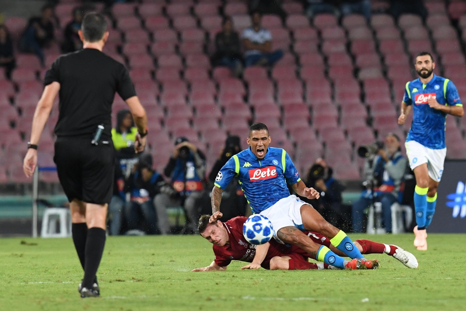 epa07067449 Napoli&#039;s Allan (R) in action against Liverpool&#039;s James Milner during the UEFA Champions League match between SSC Napoli and Liverpool FC at San Paolo stadium in Naples, Italy, 03 ...