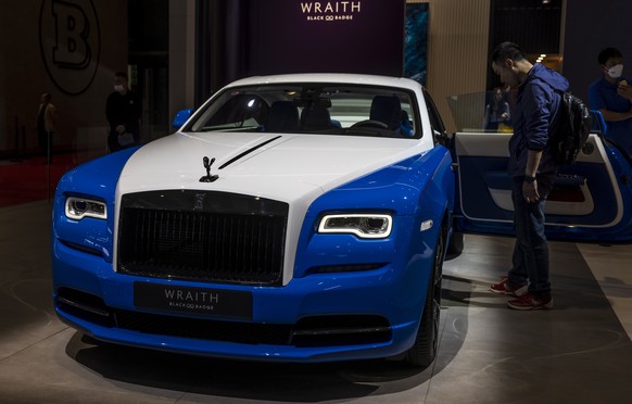epa09145429 A Rolls Royce Wraith car stands on display at the Rolls Royce trade fair stand during a media day of the Auto Shanghai 2021 motor show in Shanghai, China, 19 April 2021. The 19th Internati ...