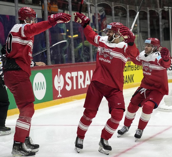 Denmark&#039;s Patrick Bjorkstrand, center, celebrates after he scored the opening goal during the group A Hockey World Championship match between Denmark and Kazakhstan in Helsinki, Finland, Saturday ...