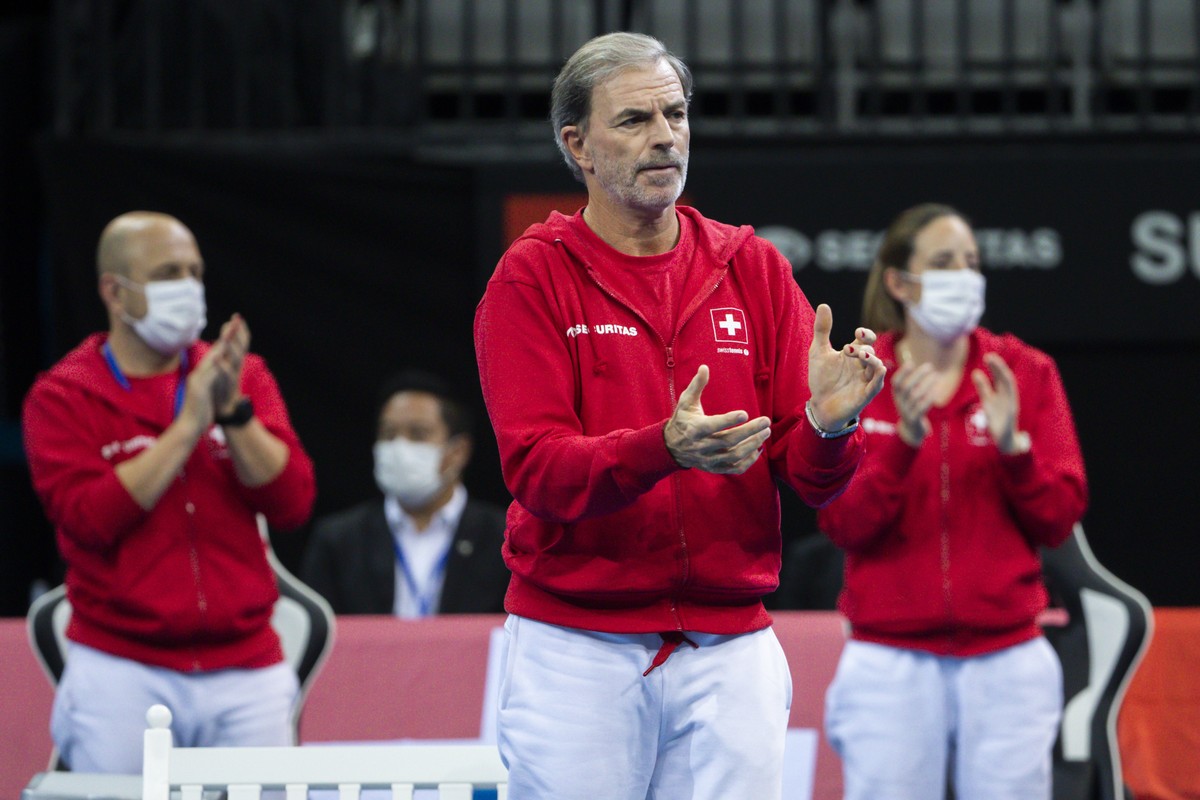 Switzerland's team captain Heinz Guenthardt reacts during Belinda Bencic's Billie Jean King Cup semi-final tennis match against Australia's Ajla Tomljanovic in Prague, Czech Republic, F ...