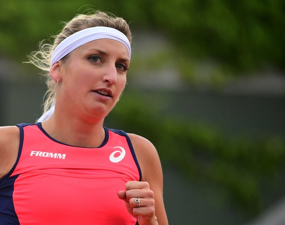 epa06006619 Timea Bacsinszky of Switzerland reacts as she plays against Ons Jabeur of Tunisia during their womenâs single 3nd round match during the French Open tennis tournament at Roland Garros in ...