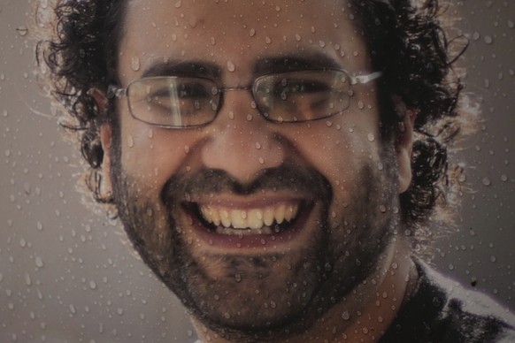 A photo of Egypt&#039;s leading pro-democracy activist Alaa Abdel-Fattah, is displayed outside the Foreign Office in London, Tuesday, Nov. 1, 2022. The family of Egypt&#039;s most prominent imprisoned ...