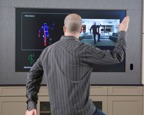 IMAGE DISTRIBUTED FOR MICROSOFT - Kinect Group Program Manager Scott Evans demonstrates the new Kinect sensor on Tuesday, May 14, 2013 in Redmond, Wash. (Photo by STEPHEN BRASHEAR/Invision for Microso ...