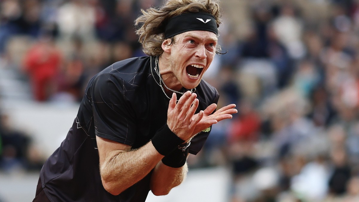 Russia's Andrey Rublev vents his frustration after missing a shot against Italy's Matteo Arnaldi during their third round match of the French Open tennis tournament at the Roland Garros stad ...
