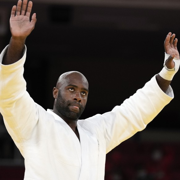 Teddy Riner of France reacts after defeating Hisayoshi Harasawa of Japan, not shown, in their men&#039;s +100kg bronze medal judo match at the 2020 Summer Olympics, Friday, July 30, 2021, in Tokyo, Ja ...