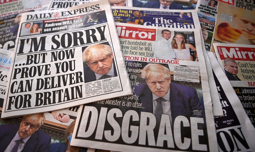 epa09682465 The UK newspaper front pages in London, Britain, 13 January 2022. The UK media has been reacting to British Prime Minister Boris Johnson&#039;s apology in parliament following lockdown par ...