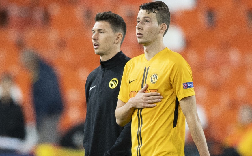 YB&#039;s Christian Fassnacht, left, and YB&#039;s Sandro Lauper, right, react after loosing the game (1-3) during the UEFA Champions League group stage group H match between Spain&#039;s Valencia CF  ...