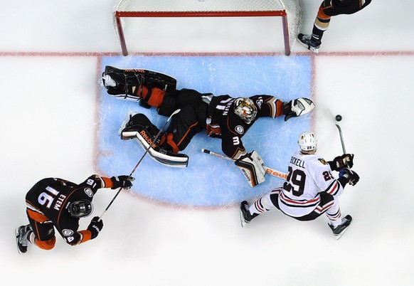 ANAHEIM, CA - MAY 17: Goaltender Frederik Andersen #31 of the Anaheim Ducks defends the net against Bryan Bickell #29 of the Chicago Blackhawks in the third period of Game One of the Western Conferenc ...