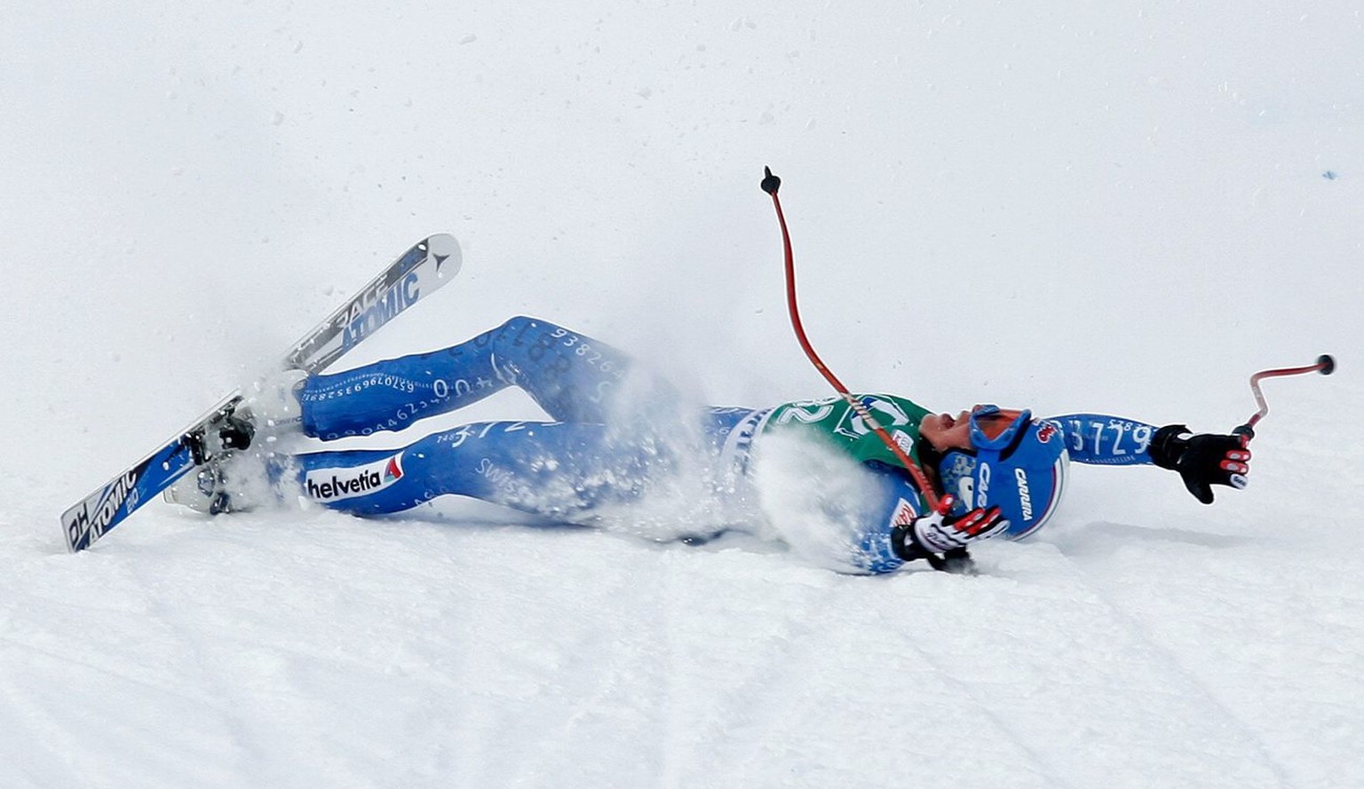 Lara Gut from Switzerland celebrates her third place after she crashed shortly before the finish area at the Women&#039;s World Cup downhill race in St. Moritz, Switzerland, Saturday, February 02, 200 ...