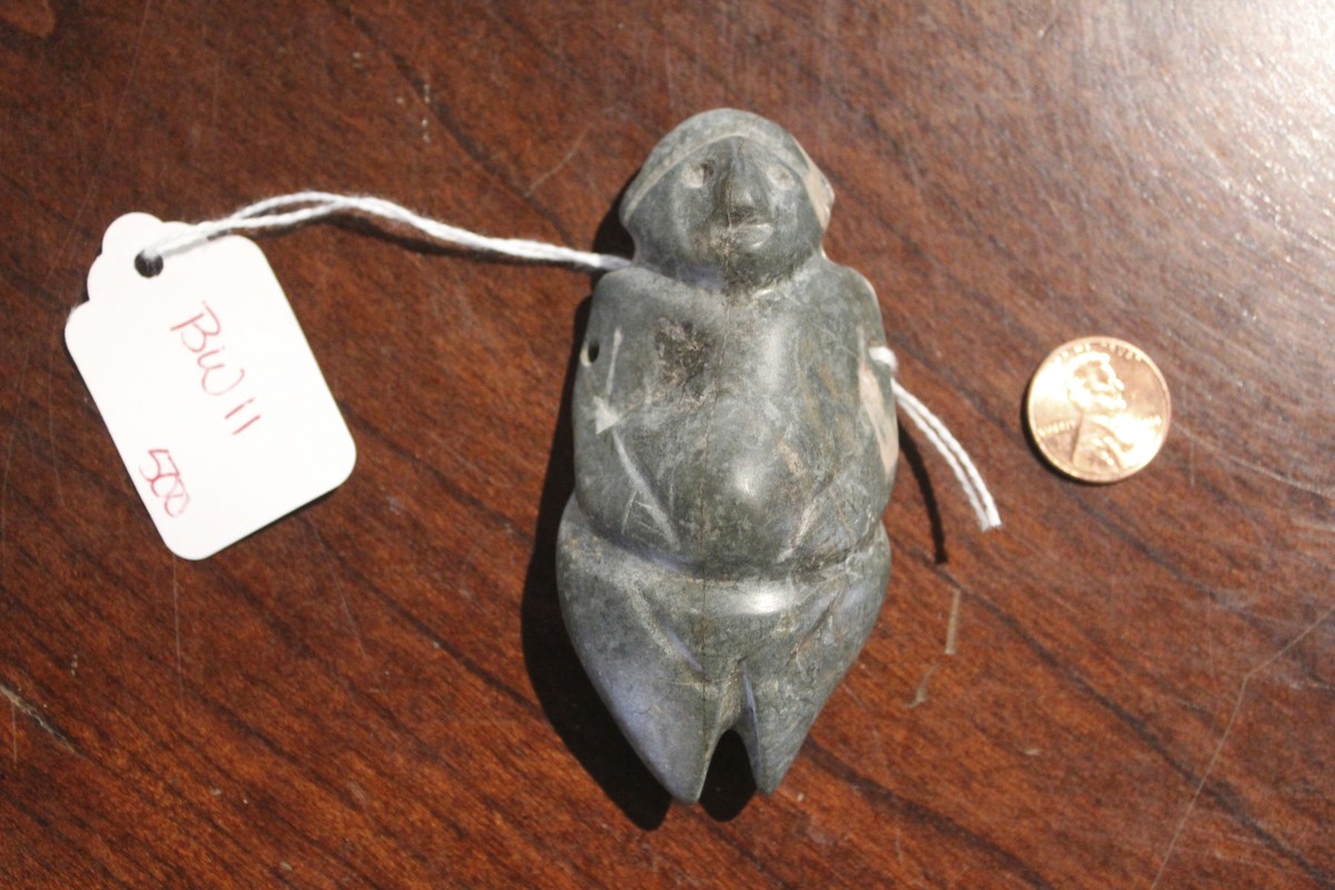 This 2022 photo provided by the Albuquerque Museum Foundation shows an Olmec greenstone figure indigenous to Mexico in Albuquerque, N.M. It's among a dozen sculptures that the Albuquerque Museum  ...
