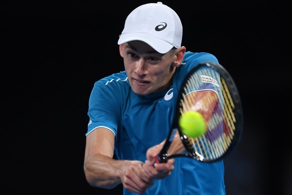 epa06442792 Alex de Minaur of Australia in action during his first round match against Tomas Berdych of the Czech Republic at the Australian Open tennis tournament, in Melbourne, Victoria, Australia,  ...