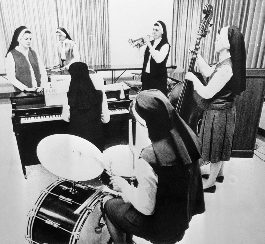 The uniforms are unusual for jazz musicians ... but these six nuns play solid jaz . They are all from the Kansas City area and play at clubs or for oganisations . On 16th May they played for Leavenwor ...