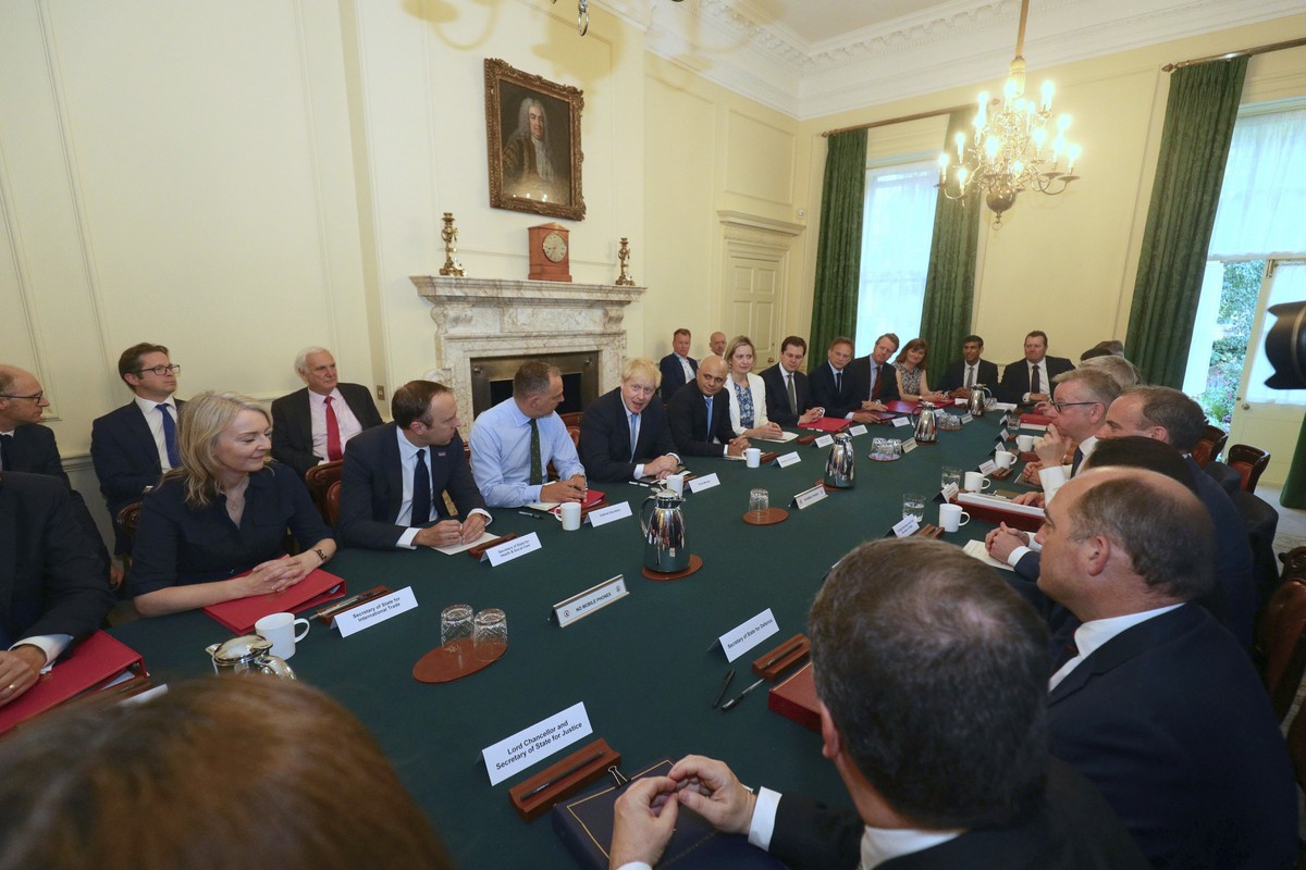 Britain's Prime Minister Boris Johnson, centre, holds his first Cabinet meeting as prime minister on Thursday July 25, 2019, pledging to break the Brexit impasse that brought down his predecessor ...