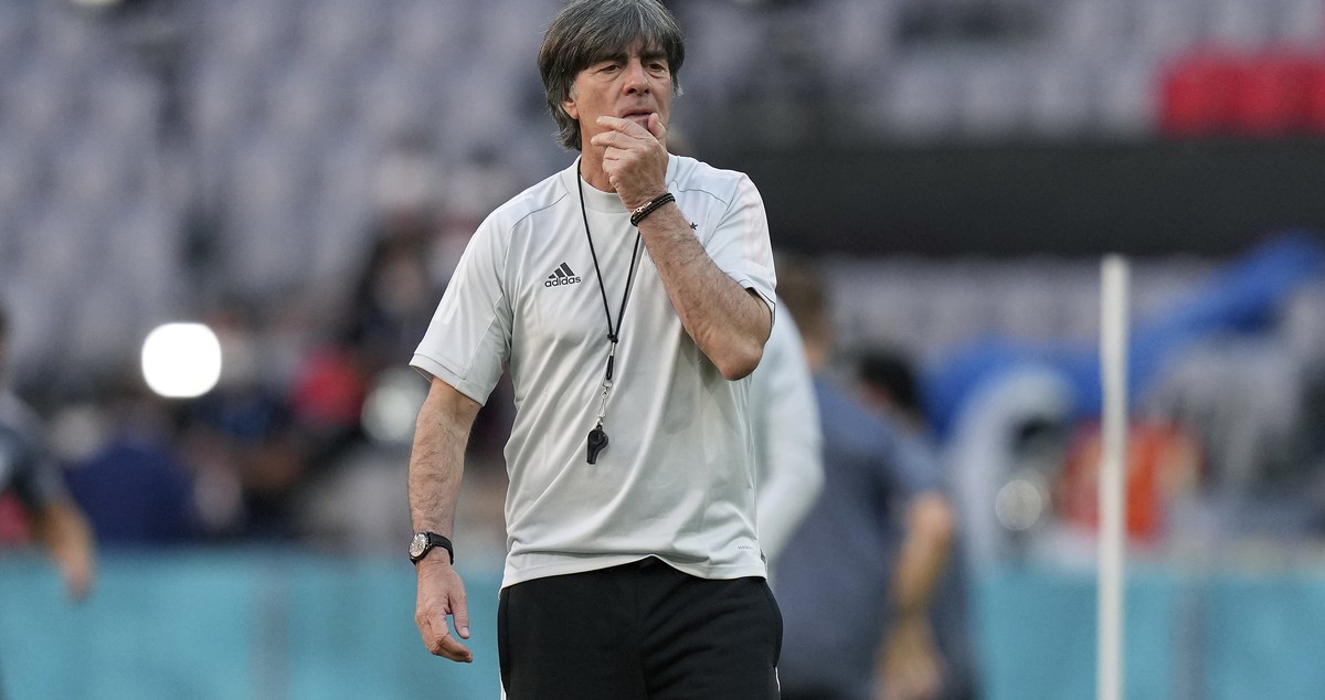 Germany's head coach Joachim Loew walks on the pitch during a team training session at Allianz Arena stadium in Munich, Monday, June 14, 2021 the day before the Euro 2020 soccer championship grou ...