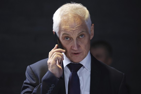 Russian First Deputy Prime Minister Andrei Belousov speaks to the mobile phone before a meeting of the Skolkovo Foundation Board of Trustees in Moscow region, Russia, on Monday, Nov. 13, 2023. Russian ...