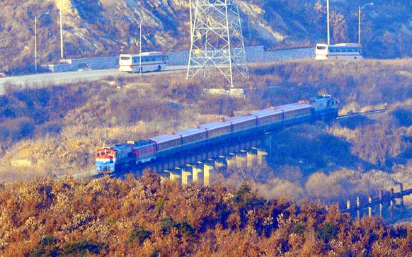 epa07248723 A special train carrying a South Korean delegation heads to the North Korean border town of Kaesong, where the groundbreaking ceremony for a project to modernize and connect cross-border r ...
