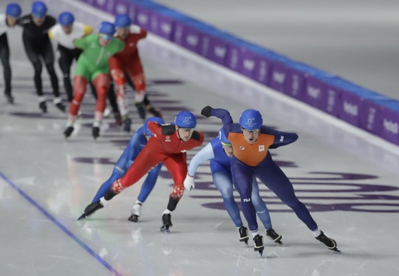 Sven Kramer of The Netherlands leads before Sverre Lunde Pedersen of Norway and Livio Wenger of Switzerland, during the men&#039;s mass start semifinal speedskating race at the Gangneung Oval at the 2 ...