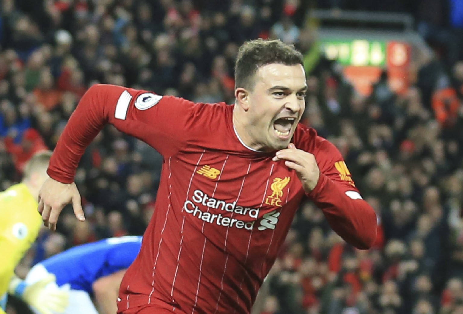 Liverpool&#039;s Xherdan Shaqiri celebrates his goal against Everton during the English Premier League soccer match between Liverpool and Everton at Anfield Stadium, Liverpool, England, Wednesday, Dec ...