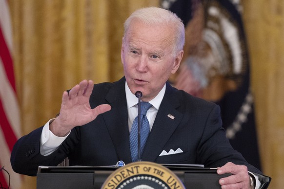 epa09707187 US President Joe Biden participates in a meeting with the White House Competition Council in the East Room of the White House in Washington, DC, USA, 24 January 2022. The meeting was held  ...