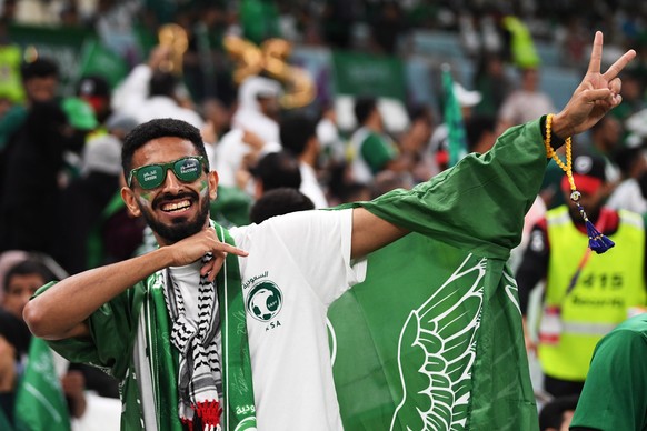 epa10339641 A Saudi fan gestures ahead of the FIFA World Cup 2022 group C soccer match between Saudi Arabia and Mexico at Lusail Stadium in Lusail, Qatar, 30 November 2022. EPA/Neil Hall